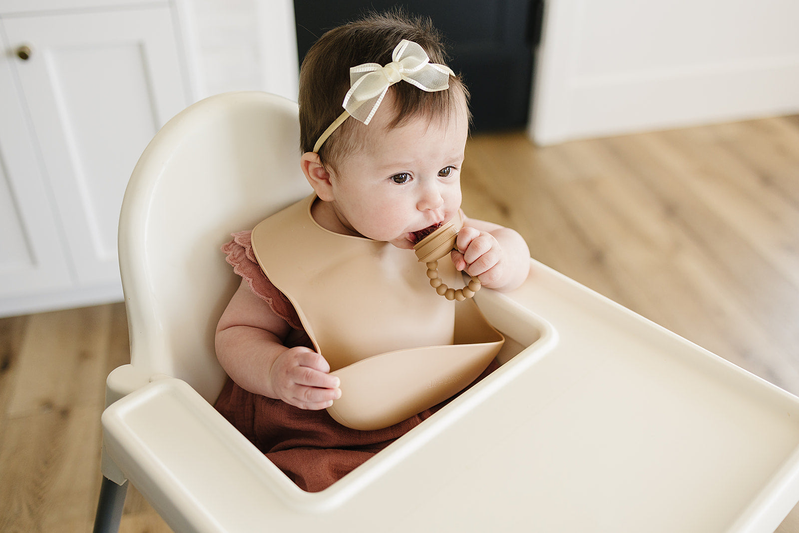 baby using pacifier fruit feeder 