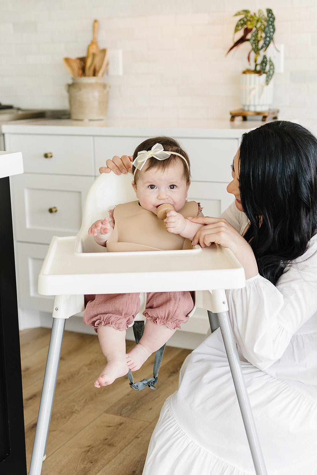 Baby wearing a silicon bib