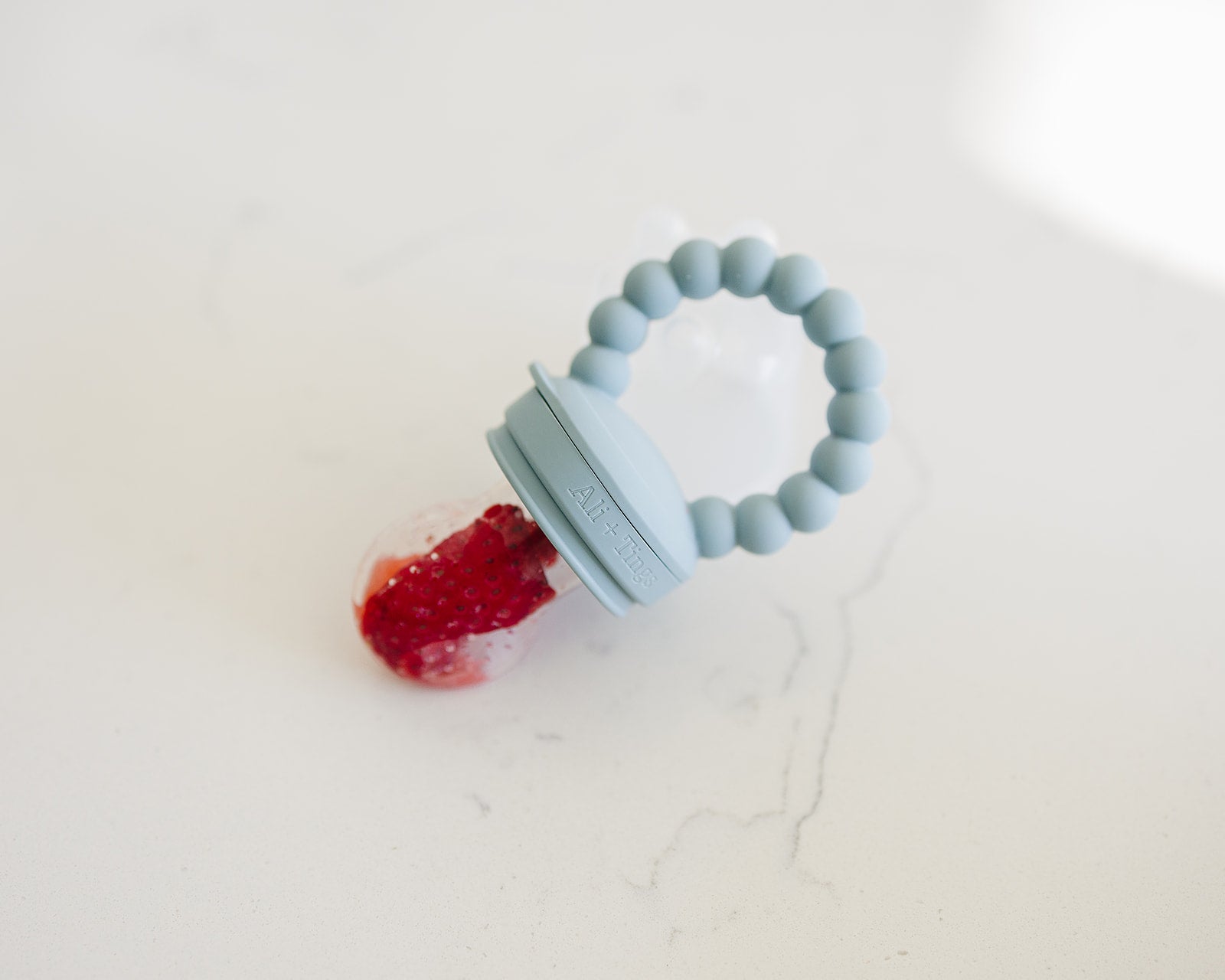 BPA-free baby food feeder with soft nipple
