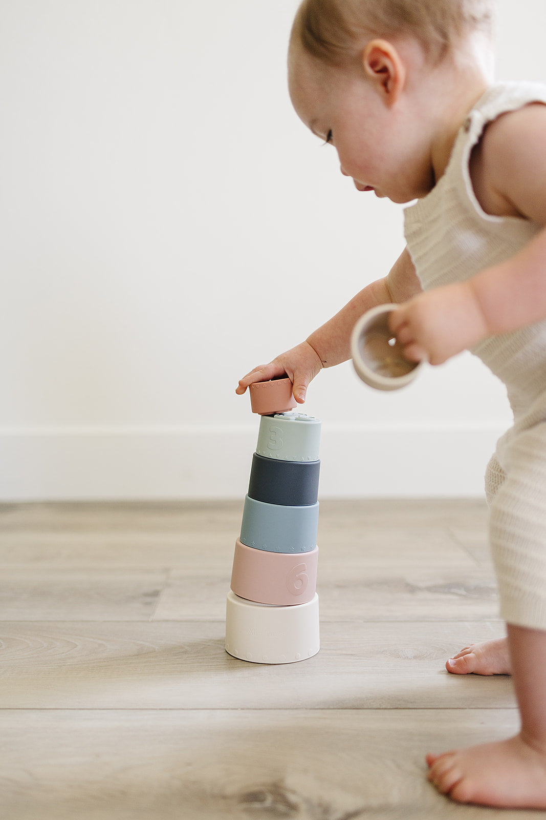7 silicone stacking cups with numbers and textures