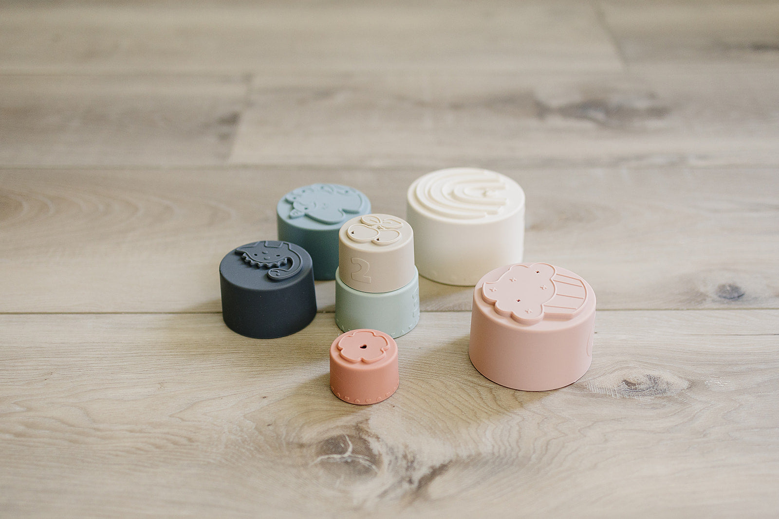 7 silicone stacking cups with numbers and textures