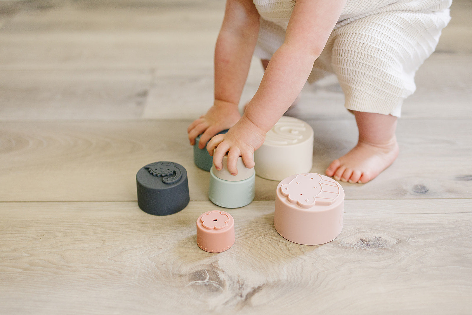 7 silicone stacking cups with numbers and textures
